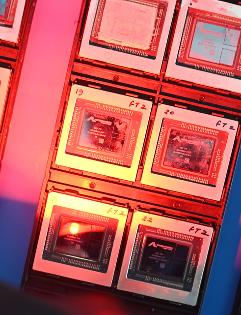 A close-up view of electronic chips with red lighting.