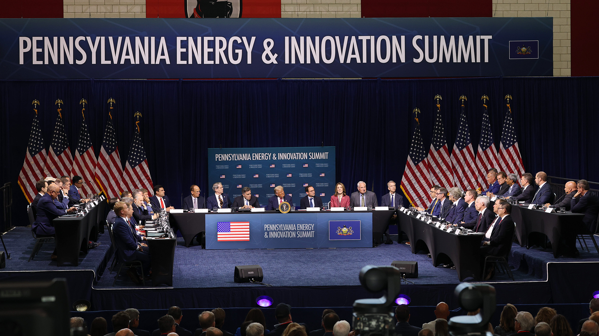 A panel of people sit on stage at the Pennsylvania Energy & Innovation Summit. 
