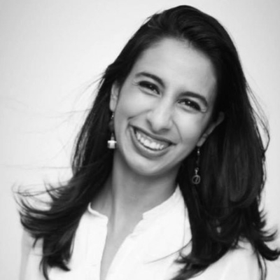 A woman smiling.