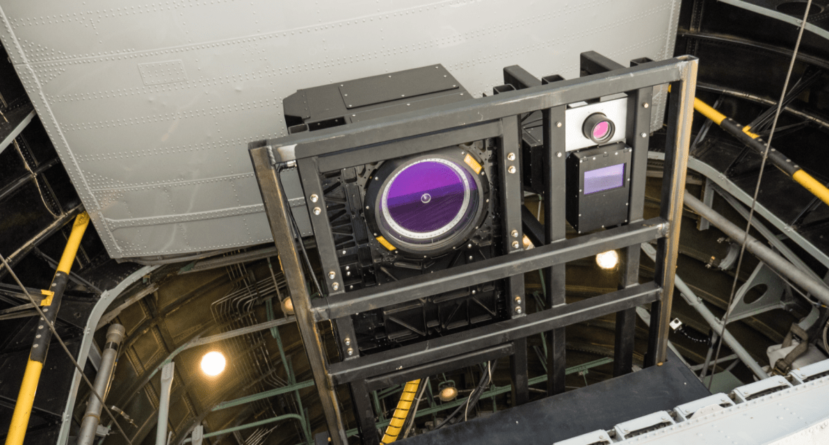 A large piece of machinery with a purple center is shown from above. 