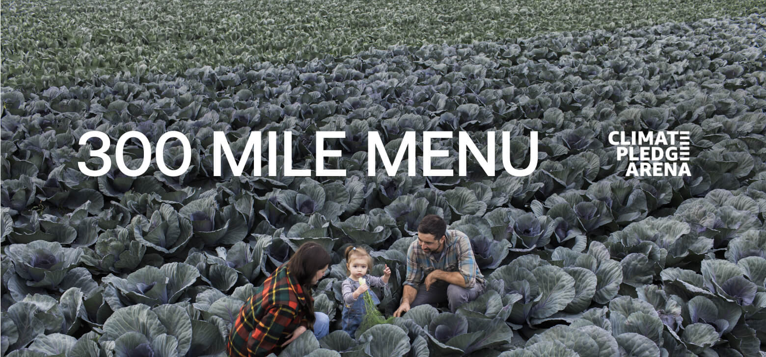 Rows of crops with two people and a child. 