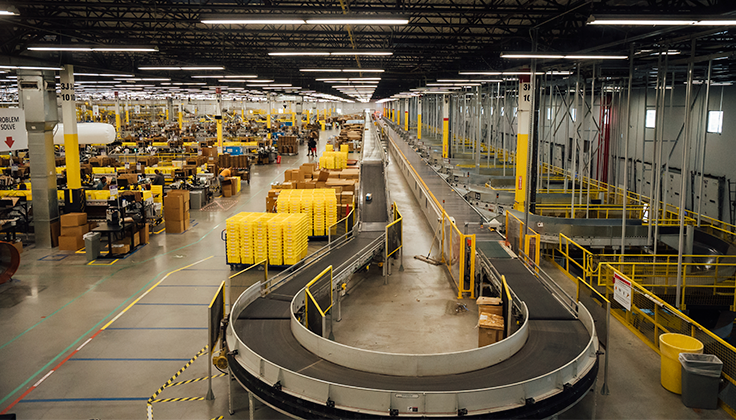 An aerial view of a conveyor belt system in a fulfillment center.